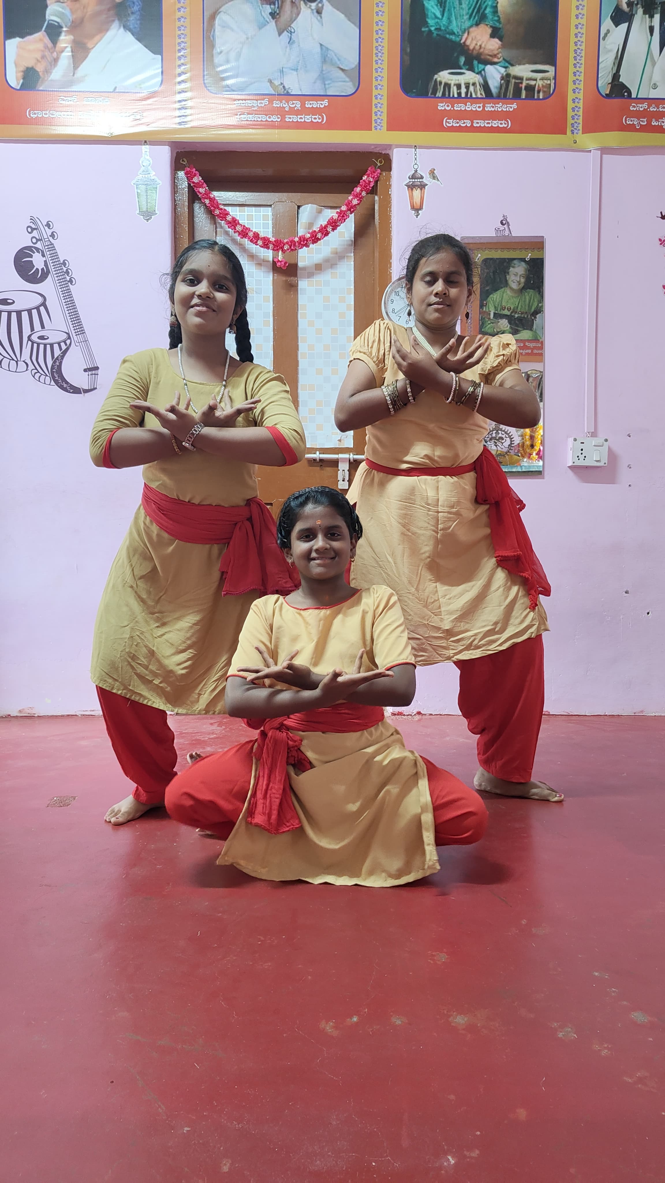 Students of Bharatanatyam holding a classical pose