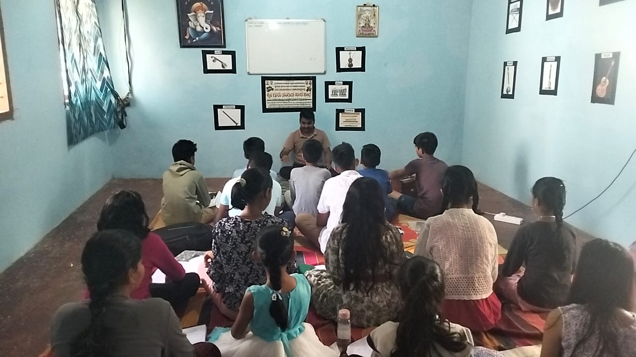 A full class of students seated for a theory and practice session at the Vidyalaya